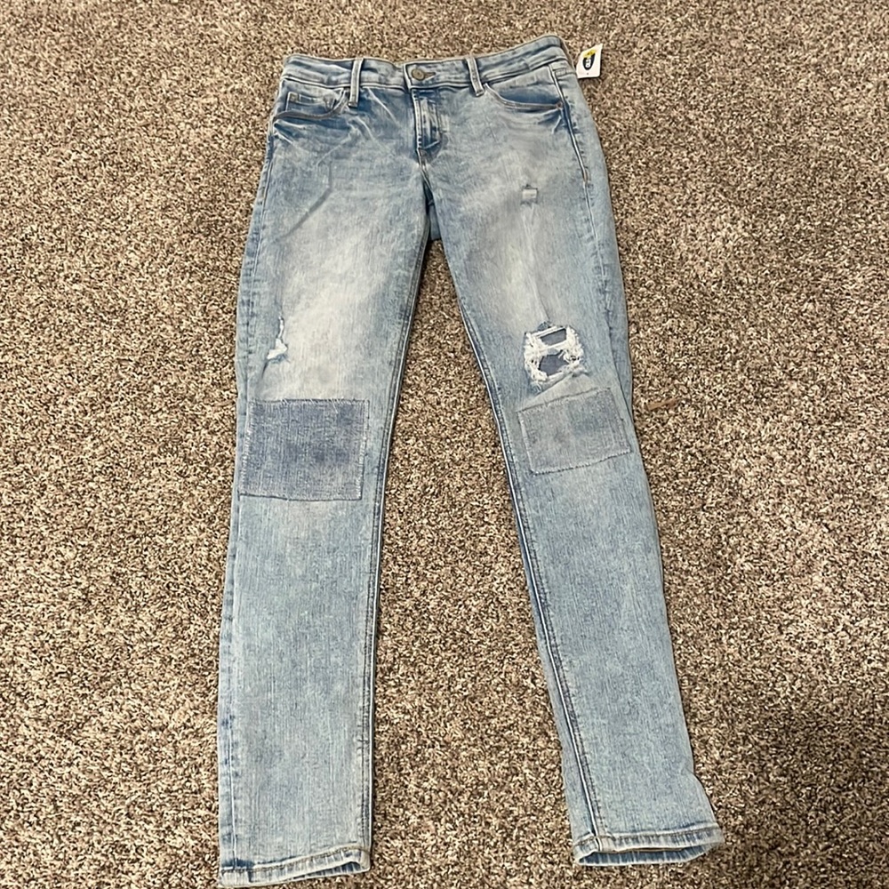 Light blue high rise ripped/patch skinny jeans